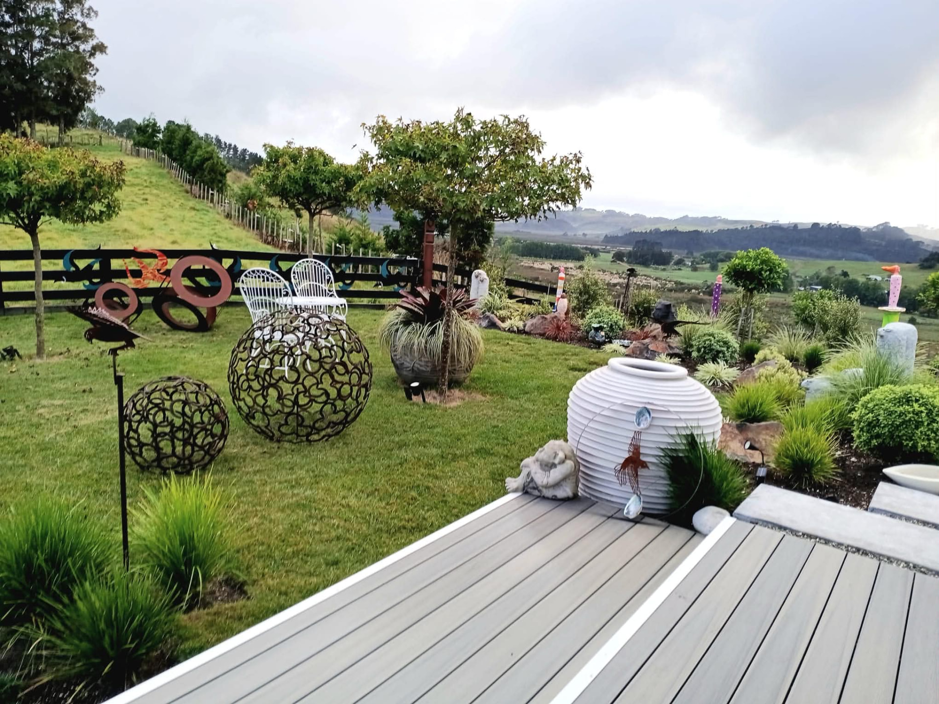 The sculpture garden and deck overlooking the countryside at White House Collectables