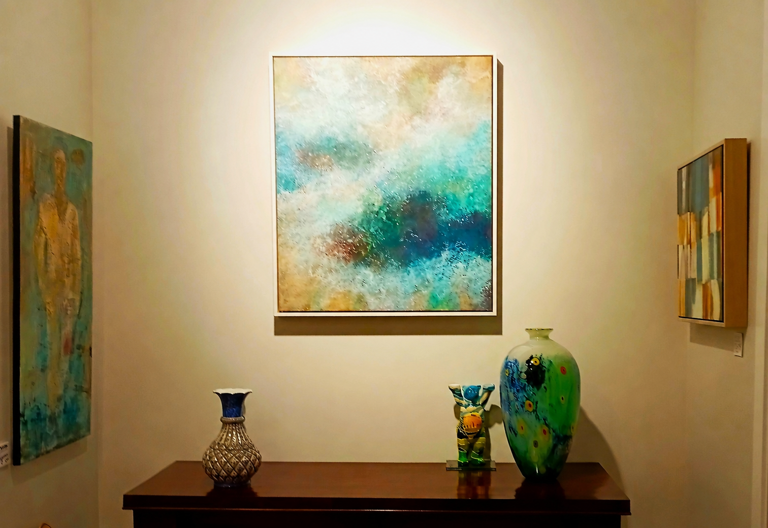 New Zealand paintings and colourful glass art displayed in the gallery